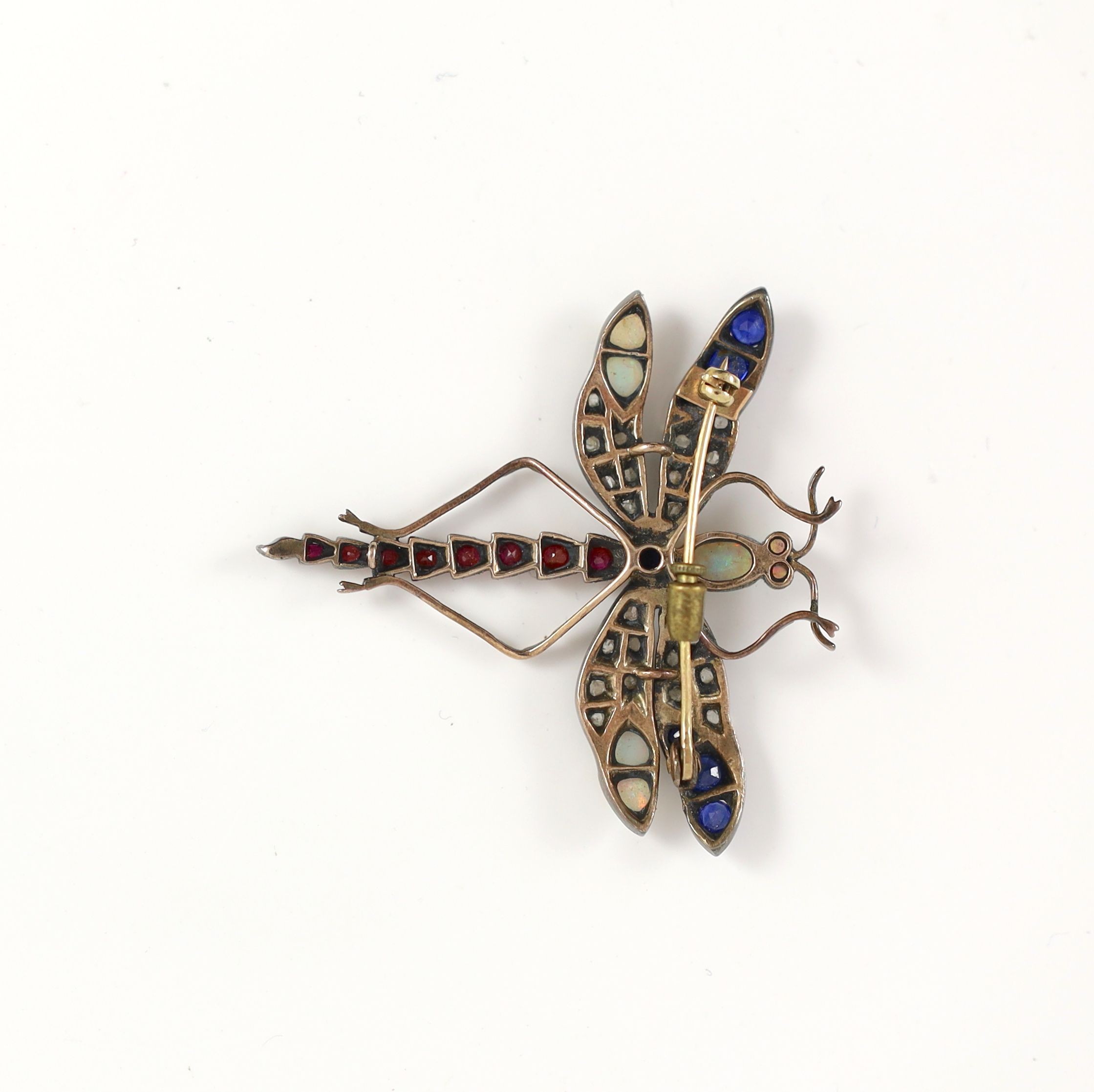 A Victorian gold and silver, opal, sapphire, ruby and diamond set dragonfly brooch
